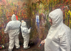 Adult Program clients enjoying a creative painting session at Splatter Craze, exploring color, self-expression and hands-on art.